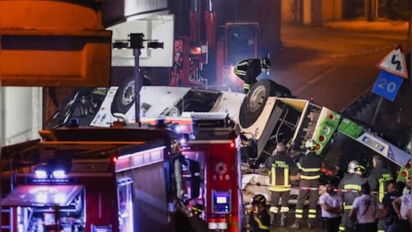 At least 21 dead after Italian bus carrying tourists falls from Venice overpass