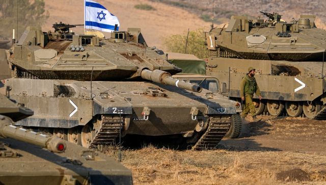 Military build-up near Gaza as Israel prepares for ground offensive Military build-up near Gaza as Israel prepares for ground offensive