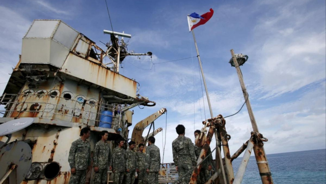 China slams Philippines over re-supply mission for troops on disputed atoll China slams Philippines over re-supply mission for troops on disputed atoll