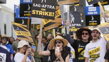 Hollywood writers vote to approve contract deal that ended strike as actors negotiate