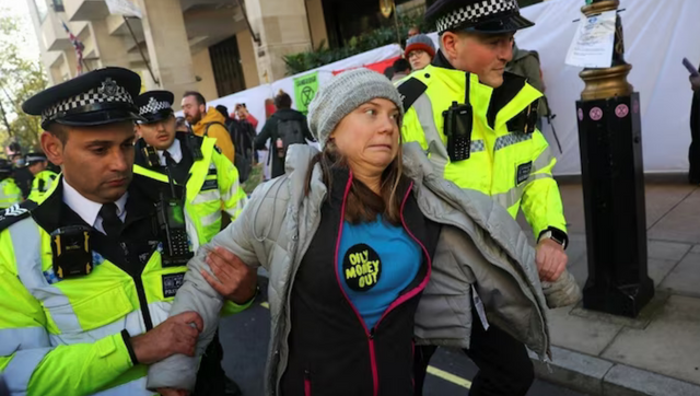 Climate activist Greta Thunberg detained in London during protest against oil companies Climate activist Greta Thunberg detained in London during protest against oil companies