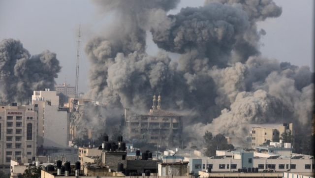 Gravediggers reinforced by volunteers as casualties overwhelm Israeli military cemetery Gravediggers reinforced by volunteers as casualties overwhelm Israeli military cemetery