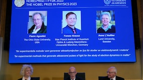 Scientists who revealed secrets of the atom win Nobel physics prize