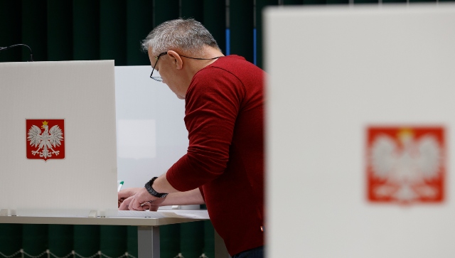 Poland votes in 'most important' election since communism Poland votes in 'most important' election since communism