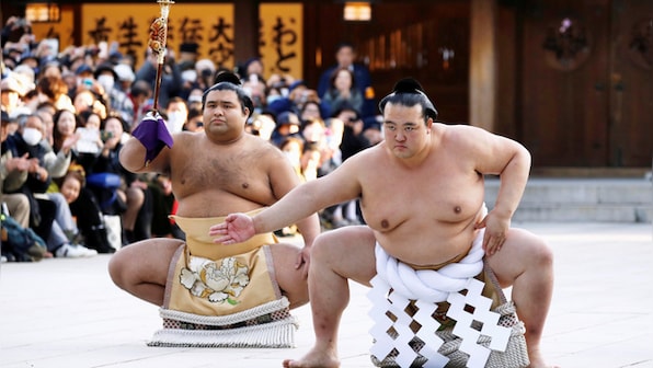 Japan's airline adds an extra plane to transport 27 sumo wrestlers after 'over-loading issue'