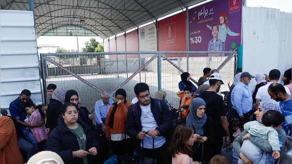 Gaza exodus from Rafah border heightens as Israel's ground invasion looms large
