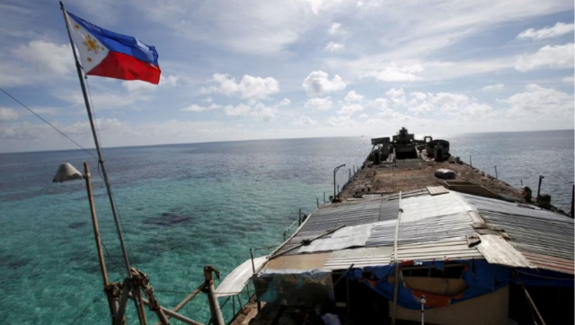 China cites 'legalities' in blocking Philippines vessels entering disputed shoal China cites 'legalities' in blocking Philippines vessels entering disputed shoal