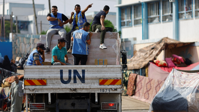 UN says thousands of people break into Gaza aid warehouses for food and other 'basic survival items' UN says thousands of people break into Gaza aid warehouses for food and other 'basic survival items'