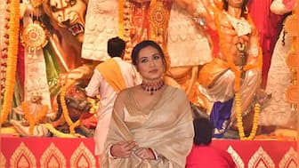 Rani Mukerji looks stunning as she arrives for Durga Puja celebrations in golden saree