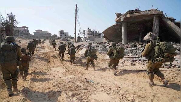 Israel Defence Minister says troops fighting 'in the heart of Gaza City'