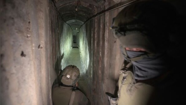 Hospitals in Gaza Strip being used as 'terror bases', says IDF as it unveils terrorist hideout beneath Shifa Hospital