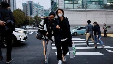 Flights halted, stock markets open late for South Korea's big exam