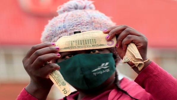 Will switching to dollars work for Argentina? Ecuador and Zimbabwe hold clues