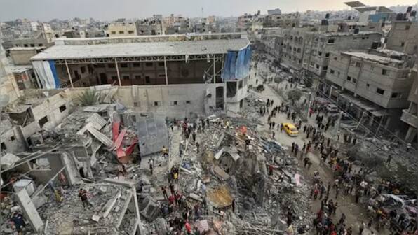 Mass grave inside Gaza hospital surrounded by Israeli forces
