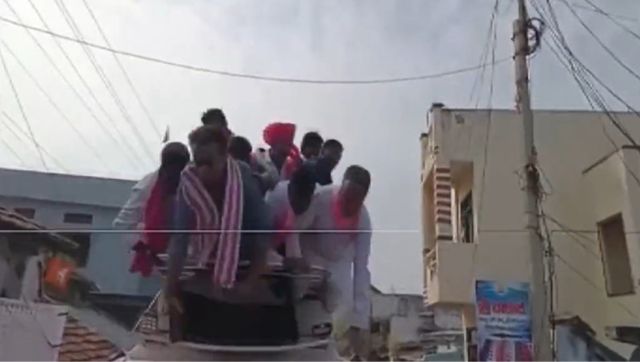 VIDEO: Telangana minister KTR Rao falls down from vehicle during election rally in Nizamabad VIDEO: Telangana minister KTR Rao falls down from vehicle during election rally in Nizamabad