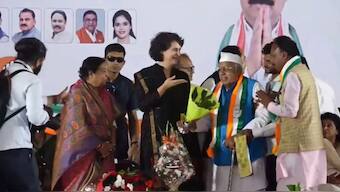WATCH | Priyanka Gandhi greeted with empty bouquet sans flowers on stage by Congress leader