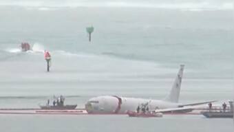 WATCH: US Navy plane with nine onboard overshoots runway, lands in ocean