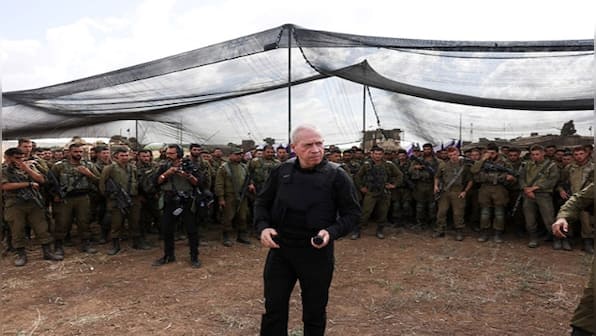 'Terrorists fleeing south, civilians looting Hamas bases':  Israel Defence Minister says Hamas has lost control in Gaza