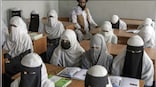 Taliban arrest women for 'bad hijab' in first dress code crackdown since return to power