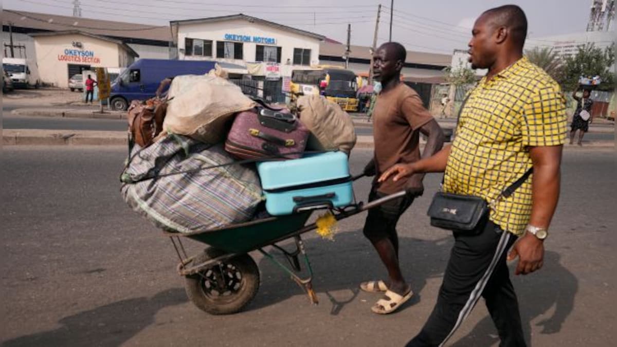 Nigeria slashes transport fees during the holidays to ease some of the pain of austerity measures