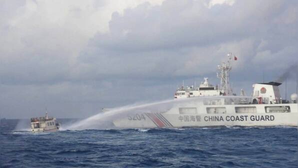 Philippines says military chief was aboard ship attacked by Chinese vessels