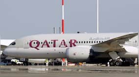 Qatar Airways fired flight attendant after police called him 'sex worker' for wearing high-end clothing, makeup