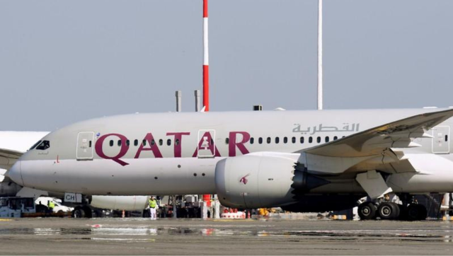 Qatar Airways fired flight attendant after police called him 'sex worker' for wearing high-end clothing, makeup Qatar Airways fired flight attendant after police called him 'sex worker' for wearing high-end clothing, makeup