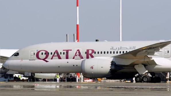 Qatar Airways fired flight attendant after police called him 'sex worker' for wearing high-end clothing, makeup