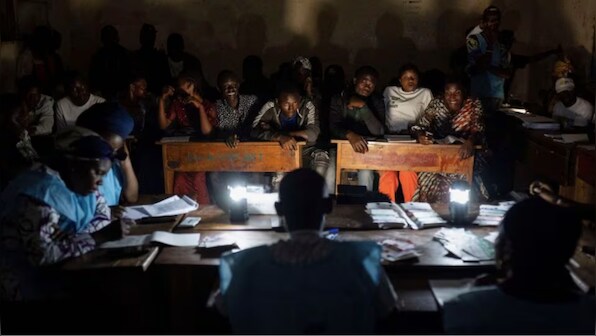 Congo votes in extended election while opposition demands a repeat