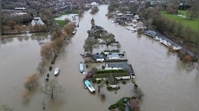 UK hit by flooding after heavy rain swells major rivers
