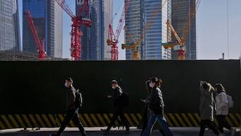 China launches barrage of new policies to mend its economy, fend off financial crisis