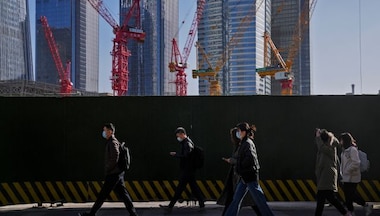 China launches barrage of new policies to mend its economy, fend off financial crisis
