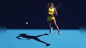 Coco Gauff of the U.S. plays a forehand return to Marta Kostyuk of Ukraine during their quarterfinal match at the Australian Open tennis championships at Melbourne Park, Melbourne, Australia, Tuesday, Jan. 23, 2024. (AP Photo/Asanka Brendon Ratnayake)