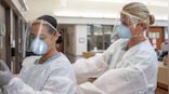 At US hospitals, mask mandates return as Covid-19, flu cases log spike