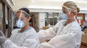 At US hospitals, mask mandates return as Covid-19, flu cases log spike