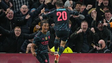 FA Cup: Nathan Ake strikes late as Manchester City oust Spurs