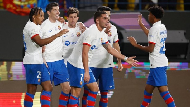 Robert Lewandowski scores as Barcelona crush Osasuna to set up Clasico Super Cup final