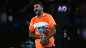 Rohan Bopanna of India holds his Australian Open trophy. AP File Photo