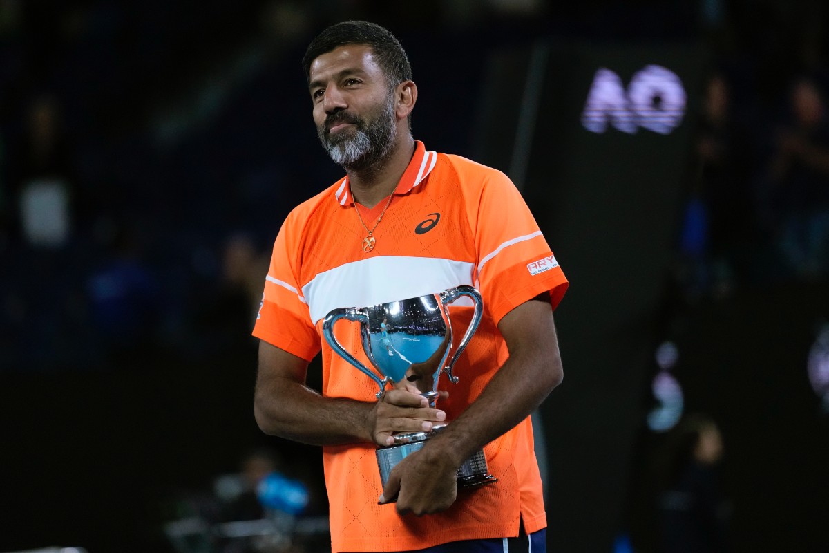 Rohan Bopanna of India holds his Australian Open trophy. AP File Photo Rohan Bopanna of India holds his Australian Open trophy. AP File Photo