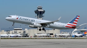 American Airlines passenger could face 20yrs jail time for punching crew members, police