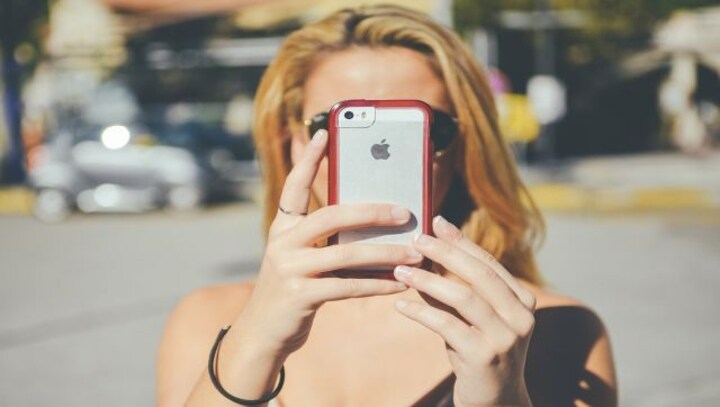Gen Z teens are covering their nose in family photos. Here’s why