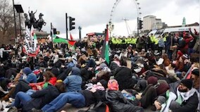 Pro-Palestinian protesters block bridge outside British parliament, demand immediate ceasefire
