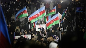 Azerbaijan's Aliyev wins by a landslide, poll observers say presidential vote marred by irregularities