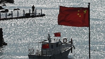 On February 14, while being chased by the Taiwanese coast guard, a Chinese speedboat carrying four individuals overturned, plunging everyone on board into the water Image Courtesy AFP