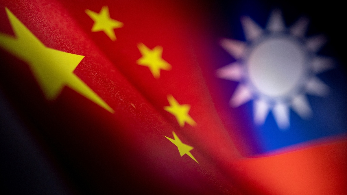 Chinese and Taiwanese printed flags are seen in this illustration taken, April 28, 2022. Reuters Chinese and Taiwanese printed flags are seen in this illustration taken, April 28, 2022. Reuters