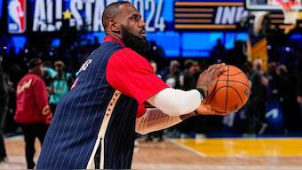 Los Angeles Lakers forward LeBron James (23) warms up before the start of the NBA All-Star basketball game in Indianapolis. AP