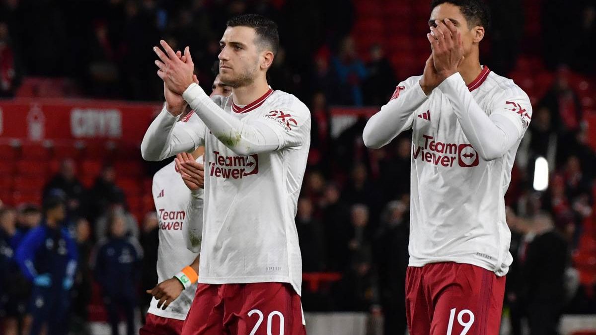 Manchester United's Diogo Dalot, left, and Raphael Varane applaud to supporters after the victory in English FA Cup fifth round vs Nottingham Forest. AP Manchester United's Diogo Dalot, left, and Raphael Varane applaud to supporters after the victory in English FA Cup fifth round vs Nottingham Forest. AP