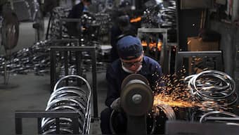 China's furious production capacity is flooding world markets with cheap exports. AP