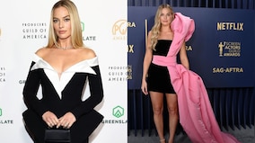 Margot Robbie dazzles in black and white Balmain mini dress at the Producers Guild Awards