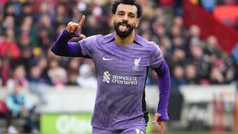 Liverpool's Mohamed Salah celebrates scoring his sides third goal during the English Premier League soccer match between Brentford and Liverpool at the Gtech Community Stadium in London, Saturday, Feb. 17, 2024. (AP Photo/Kirsty Wigglesworth)